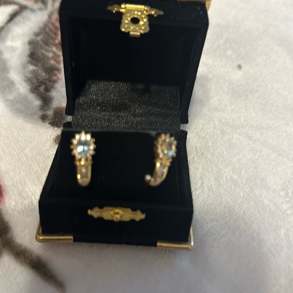 Never worn genuine, 14 karat gold, diamond and aquamarine...